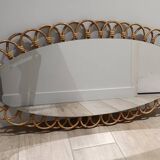 Grand miroir en rotin ovale vintage 1960