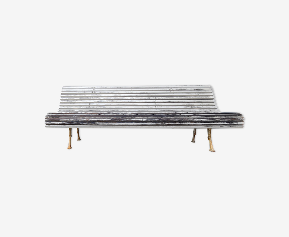 Large bench with old white garden slats