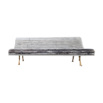 Large bench with old white garden slats