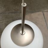 Suspended glass ball lamp by Peill & Putzler.