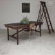 Vintage workshop folding table in oak with a hand-patinated black top.