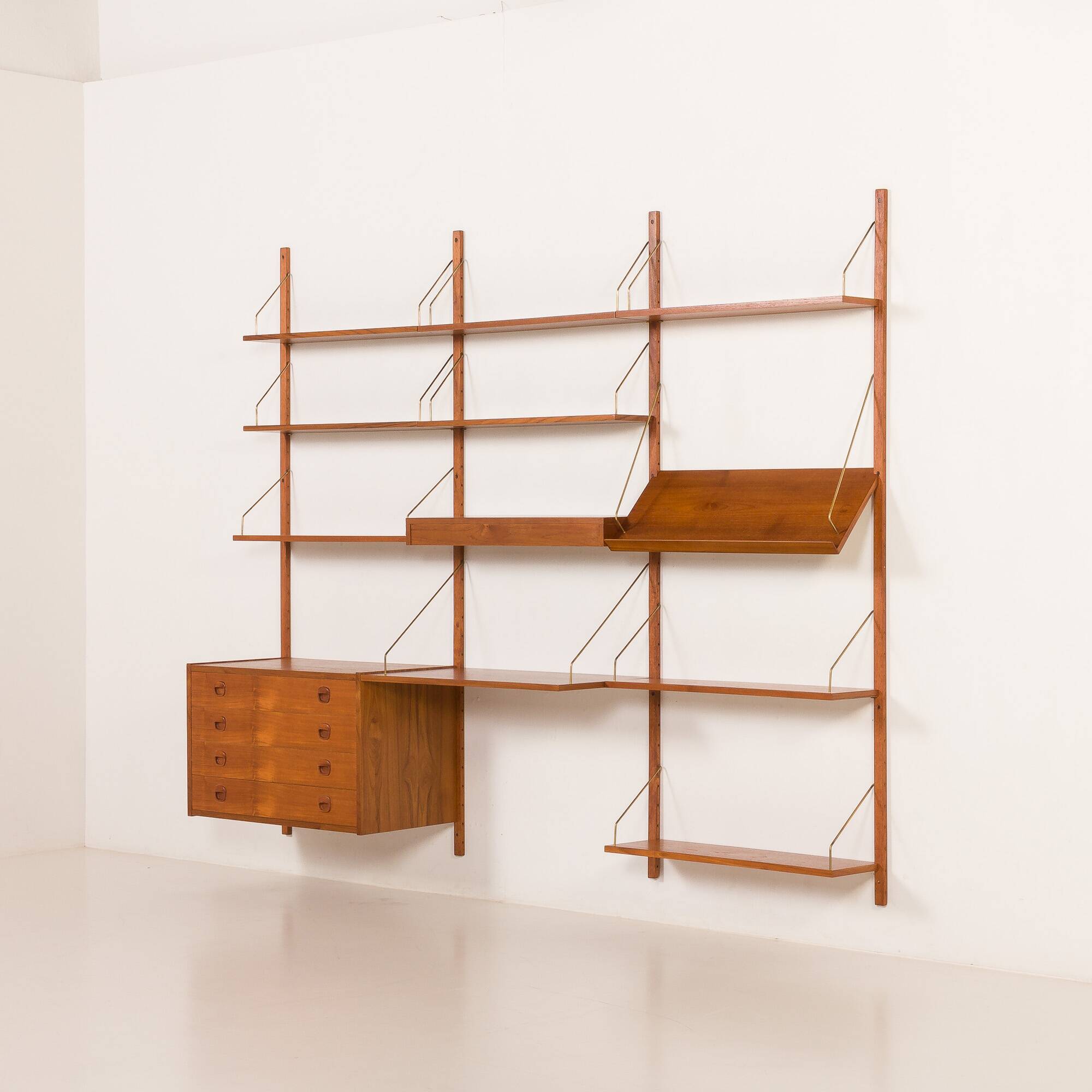Danish teak wall unit in the style of Cadovius, Sorensen with a lamp, 1970s