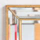 Miroir doré biseauté 115x86cm