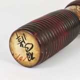 Decorative Kokeshi doll sculpture from northern Japan, hand-painted, signed.