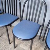 Set of 4 Stevens metal Malle chairs from the 1980s