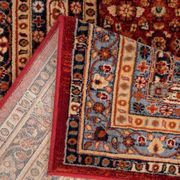 Red diamond-patterned oriental rug