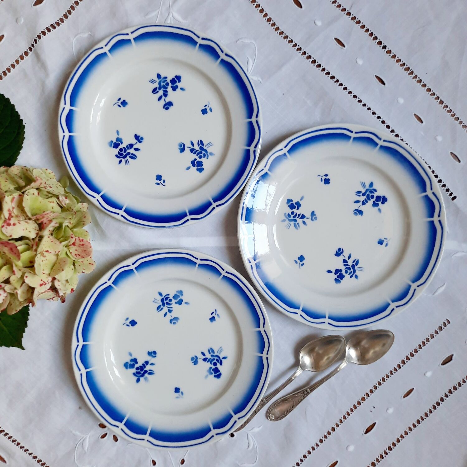 Mismatched old dessert plates accompanied by a dish
