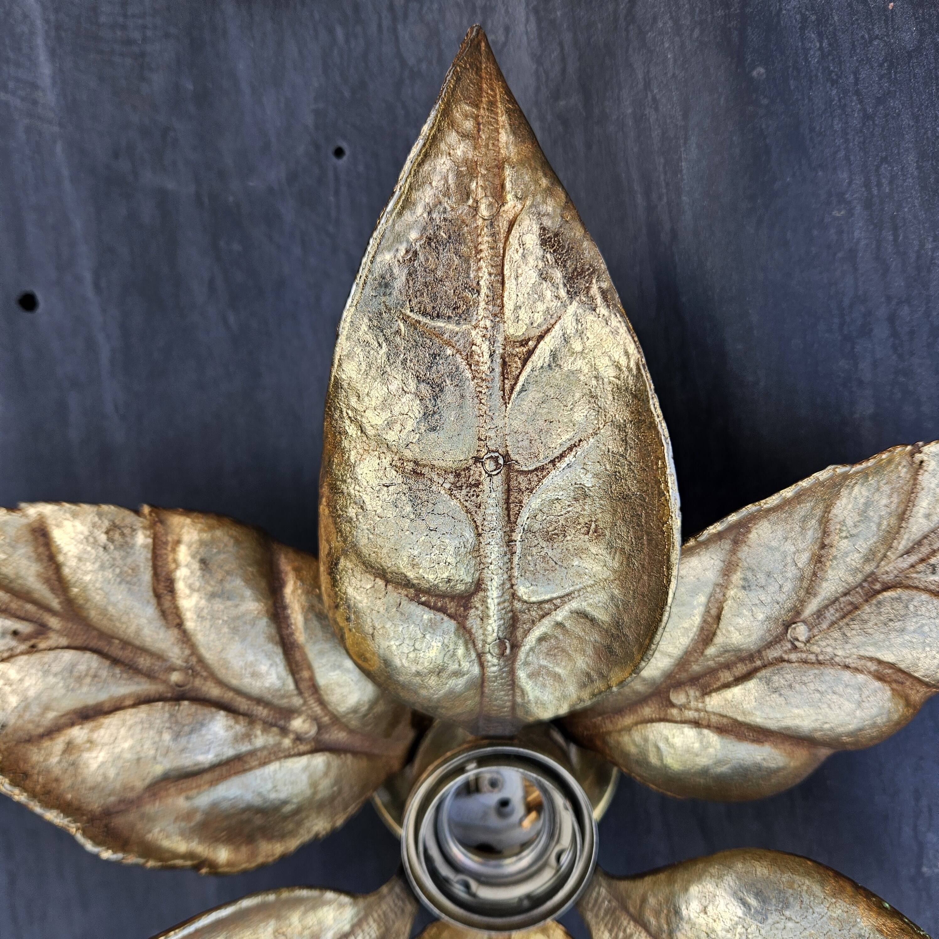 Pair of Massive wall lamps, designed by Willy Daro. 70s