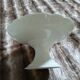 White compote dish with scalloped edges