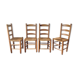 Lot of 4 wooden chairs asssise mulched