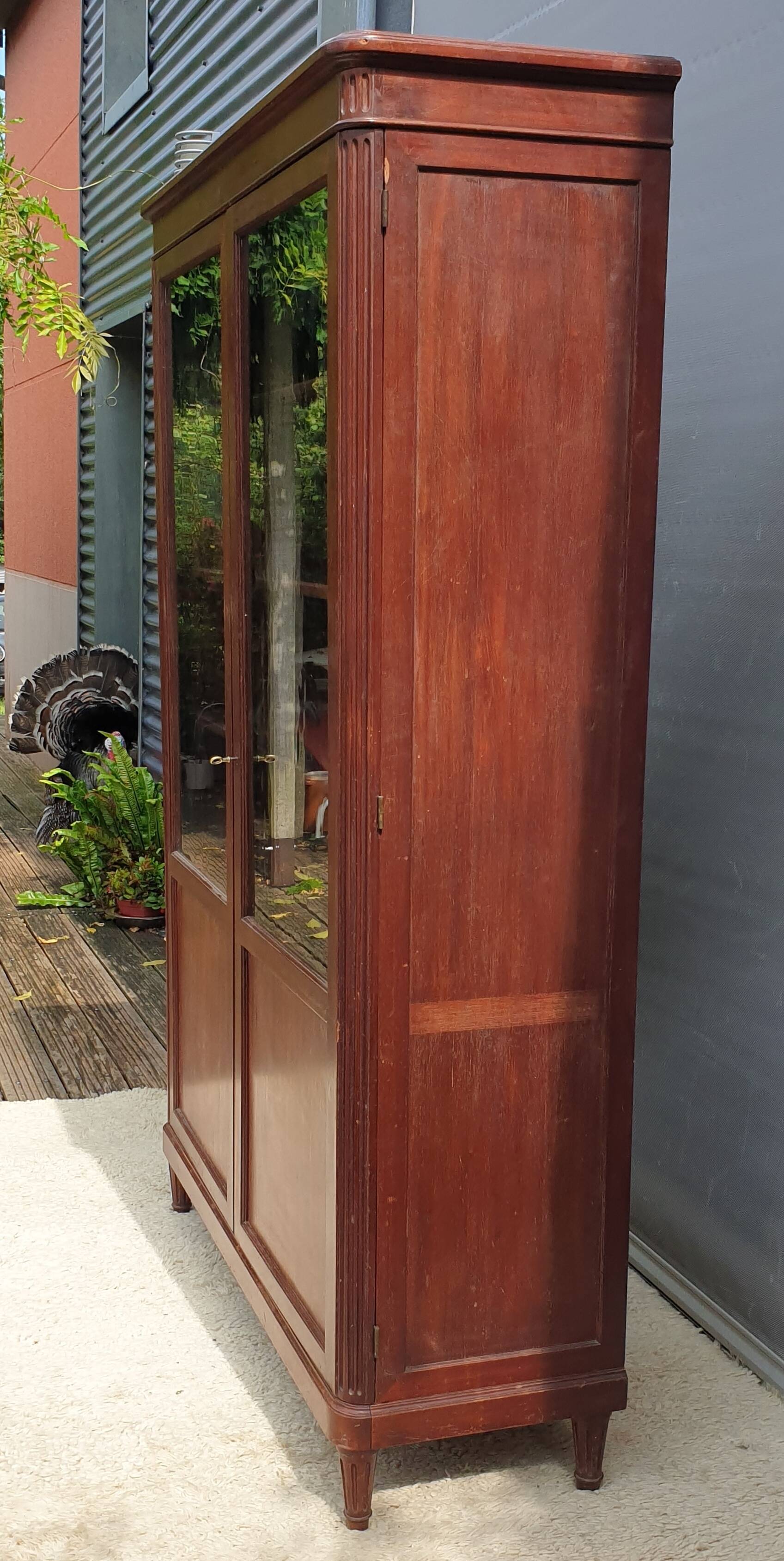 Mahogany library showcase Louis XVI style