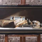 Still life with pewter inkstand and old books – Marjolein van den Berg