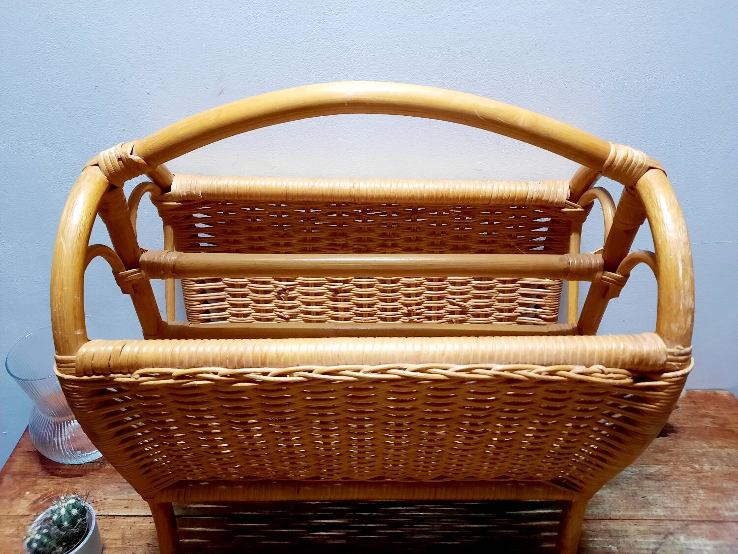 Antique rattan magazine rack