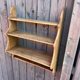 Artisanal shelf in raw wood