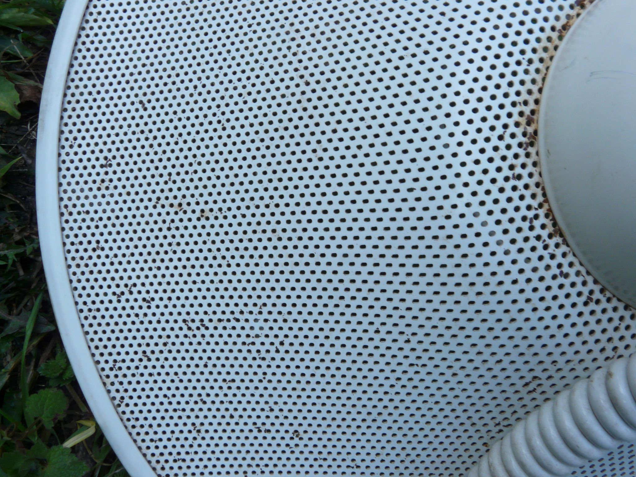 White perforated sheet metal chandelier