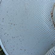 White perforated sheet metal chandelier