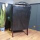 Blue chesterfield barrel back armchair