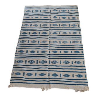Traditional handmade white and blue kilim rug in natural wool
