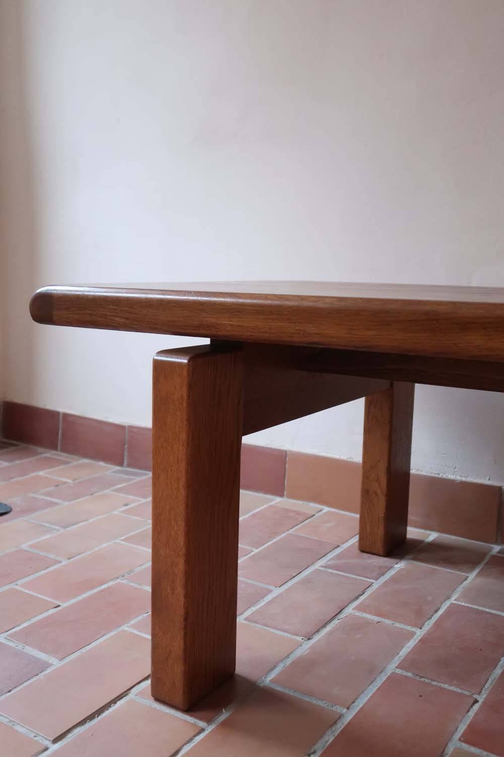 Large solid retractable coffee table