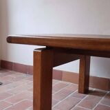 Large solid retractable coffee table