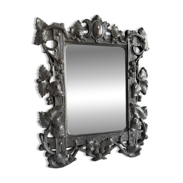 Small Napoleon III mirror in gutta-percha with vine decoration, 19th century.