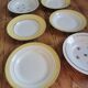 Vintage mismatched yellow and gold soup plates