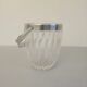 Small transparent crystal ice bucket Demeyere with stainless steel handle.