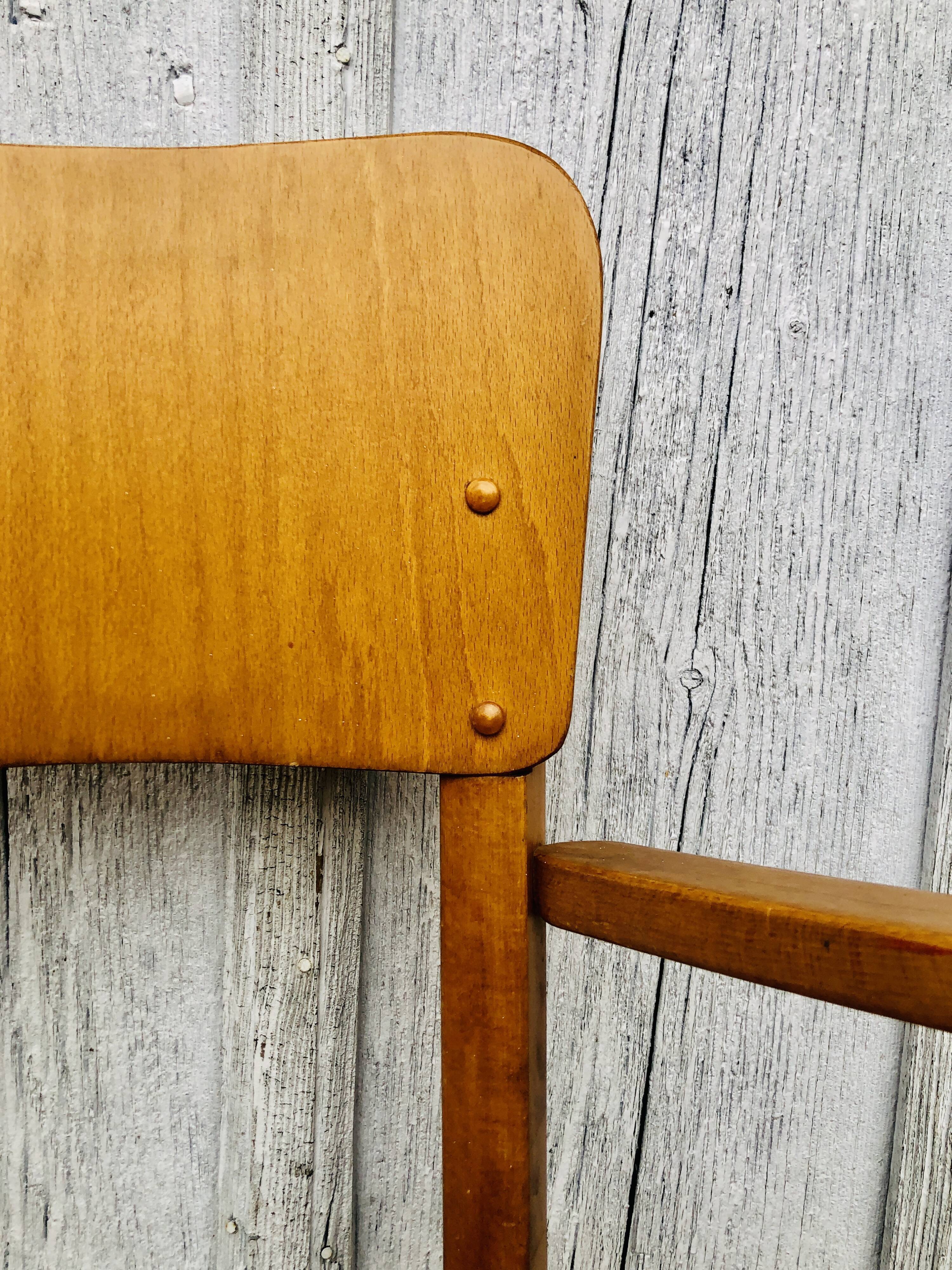 Baumann armchair curved wood armrests