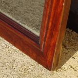 Large antique mirror in a flame mahogany frame; 132x82 cm