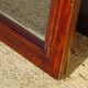 Large antique mirror in a flame mahogany frame; 132x82 cm