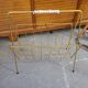 Gold-tone metal magazine rack