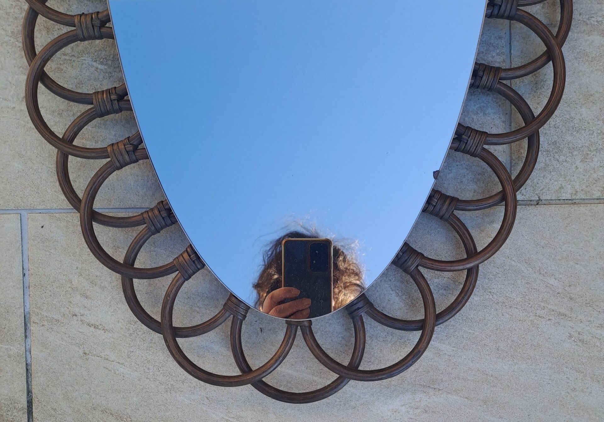 Miroir ovale en rotin années 60