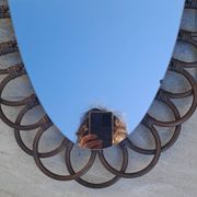 Miroir ovale en rotin années 60