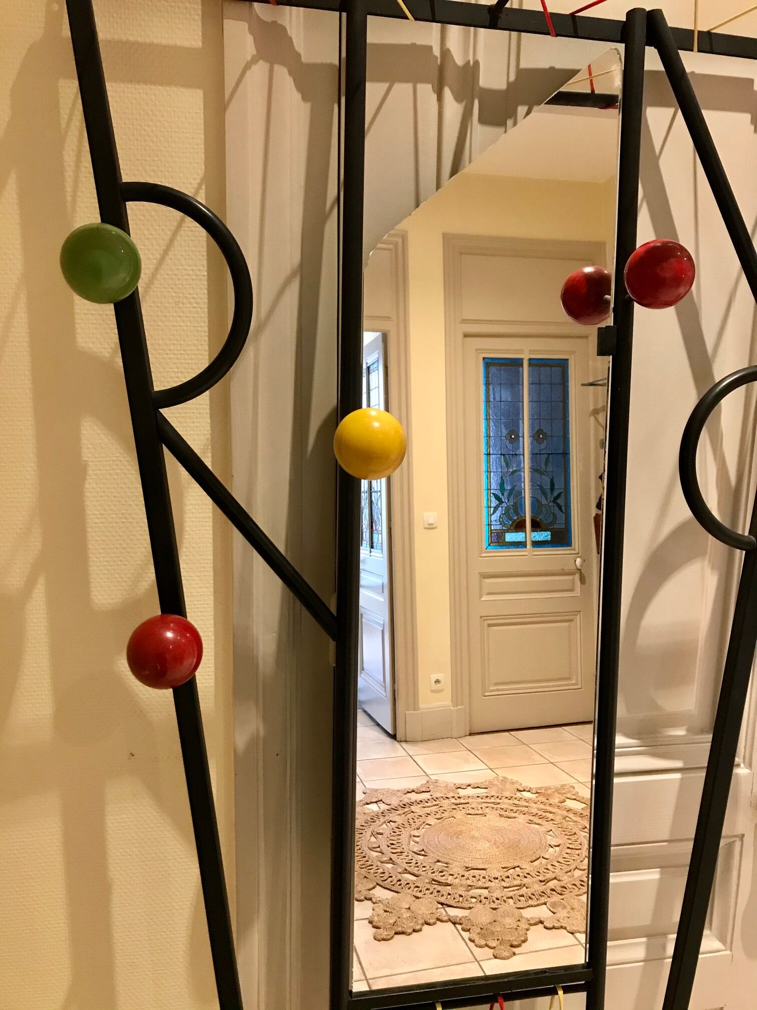 60s wall dressing room door, with colorful balls