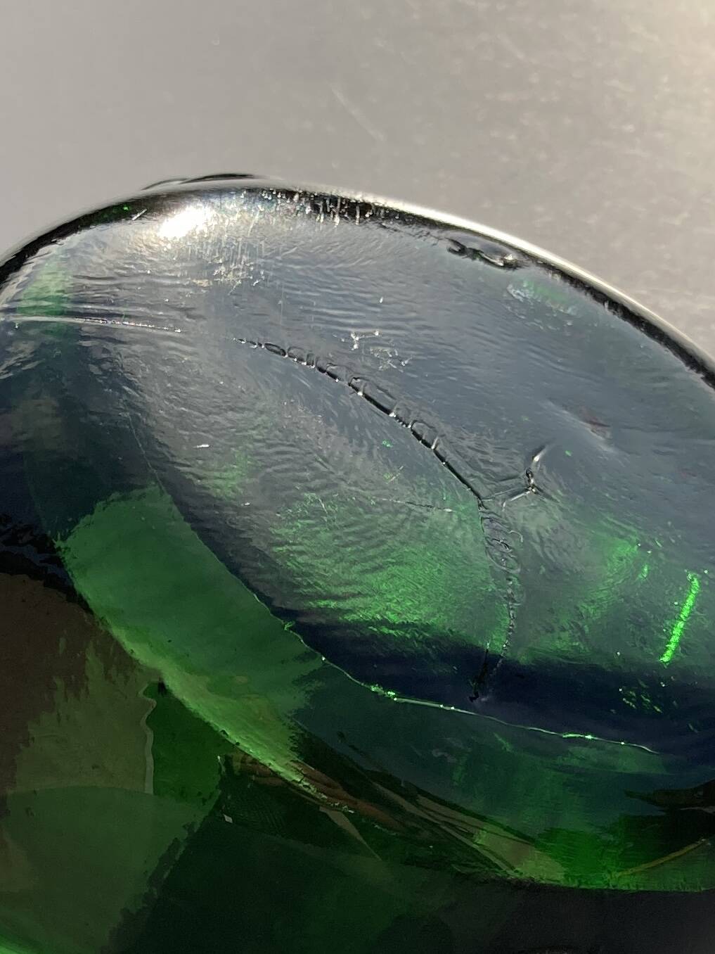Sculptural ashtray in emerald green glass