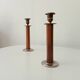 Pair of antique folk art candlesticks