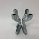 A chromed metal candle-holder "Chorus", design Karim Rashid, executed by Umbra / USA 2002