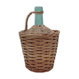 Demojohn surrounded by wicker