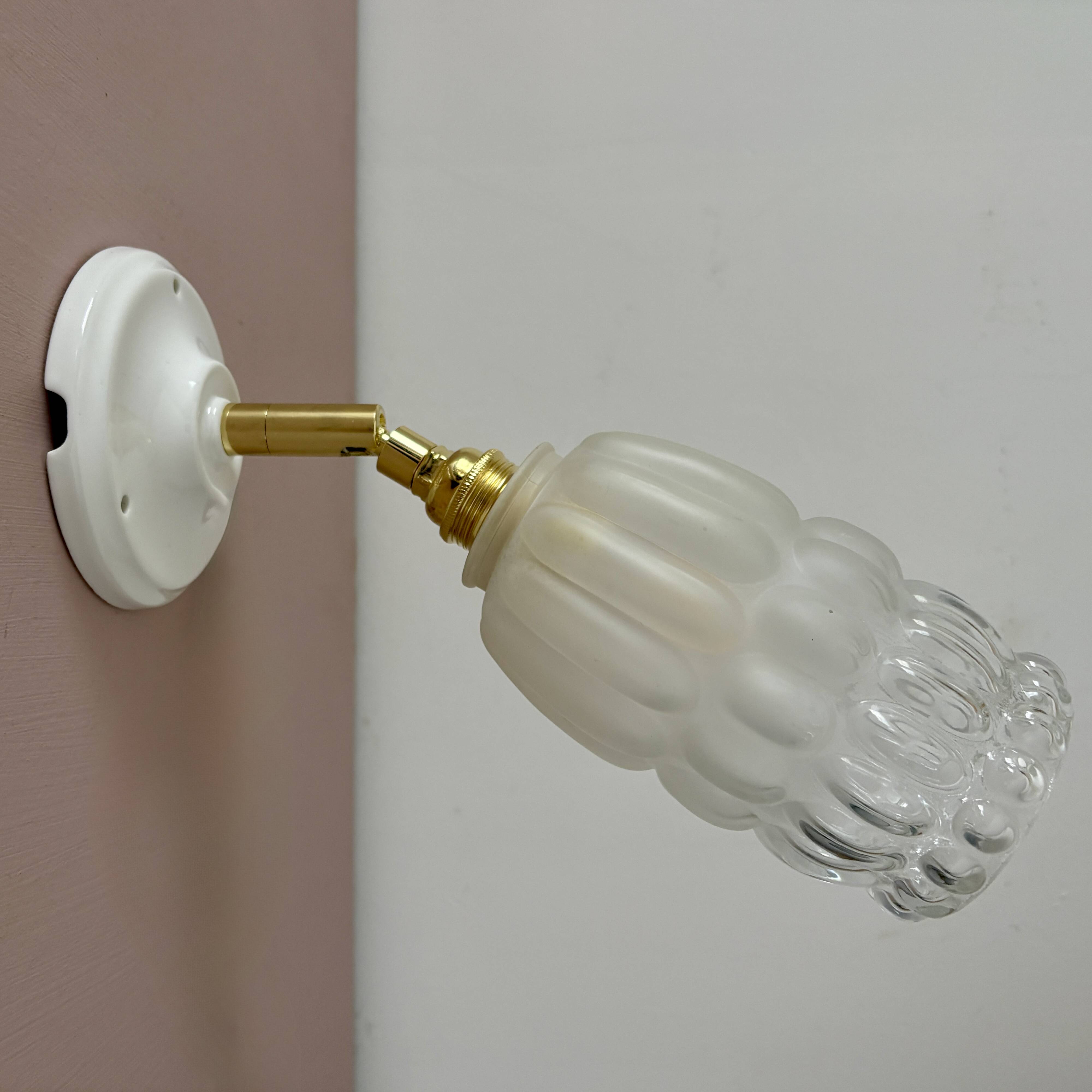 Vintage globe wall lamp in half frosted, half transparent glass