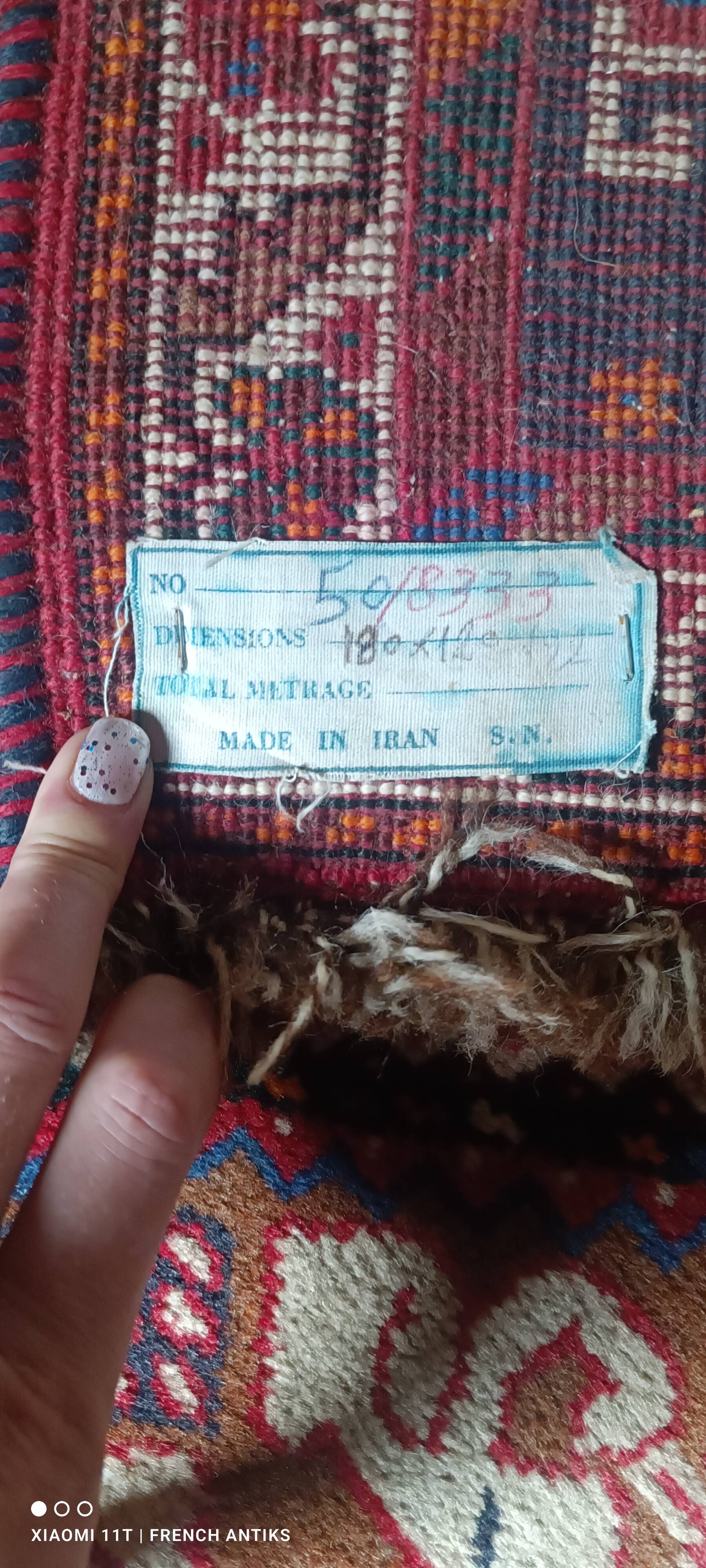 Vintage Iranian rug from the 1950s. Handcrafted, handmade.