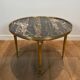 Round coffee table in brass with a marble top from the Ramsay house.