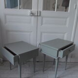 Duo of bedside tables, mismatched vintage sofa ends green of gray