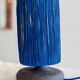 Table lamp in black stoneware and natural raffia.