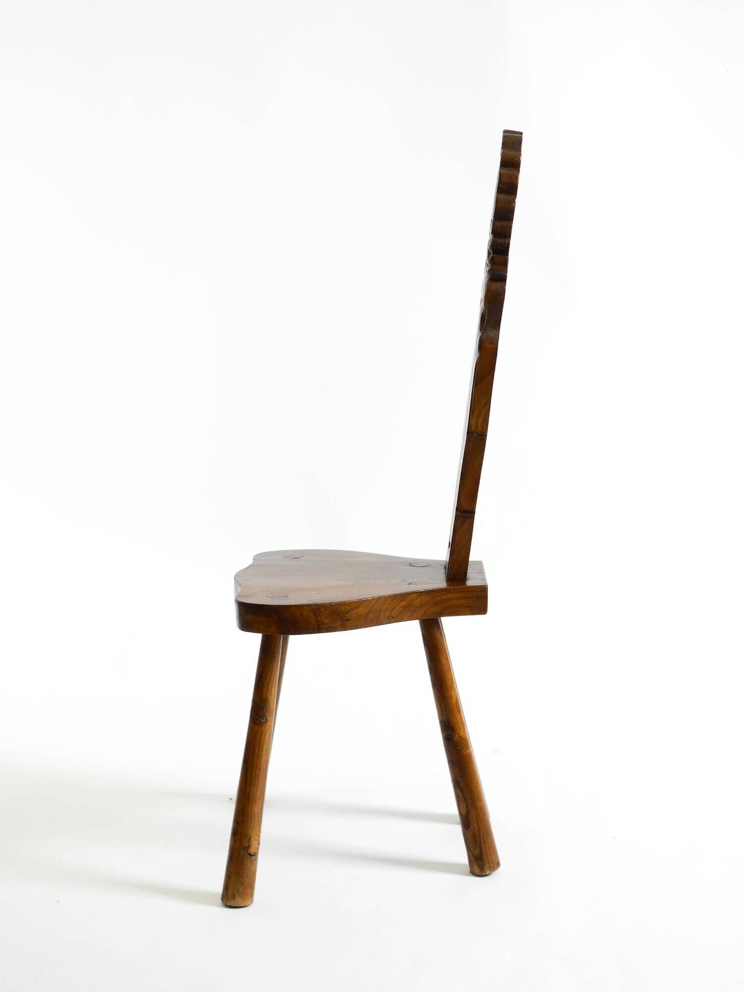Solid wood chair with an ornate, hand-carved backrest – Made in Spain