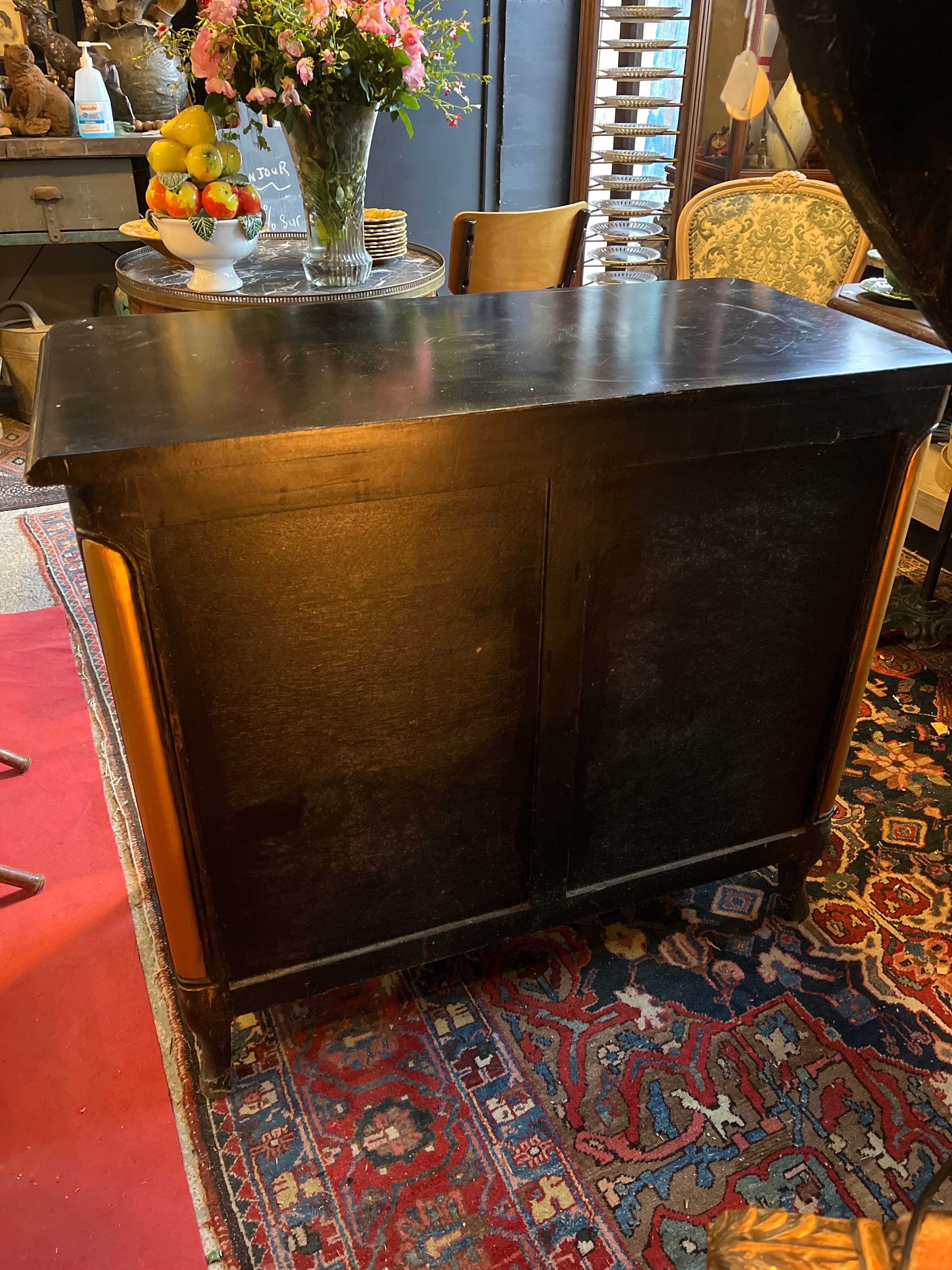 Black painted chest of drawers with golden Japanese bamboo effect