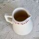 Vintage ivory earthenware milk jug with cherry pattern – Le Comptoir Pain d’Épices