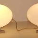 Pair of 60s wall lights in metal and opaline