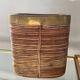 Rattan plant pot rimmed with brass from the 60s and 70s