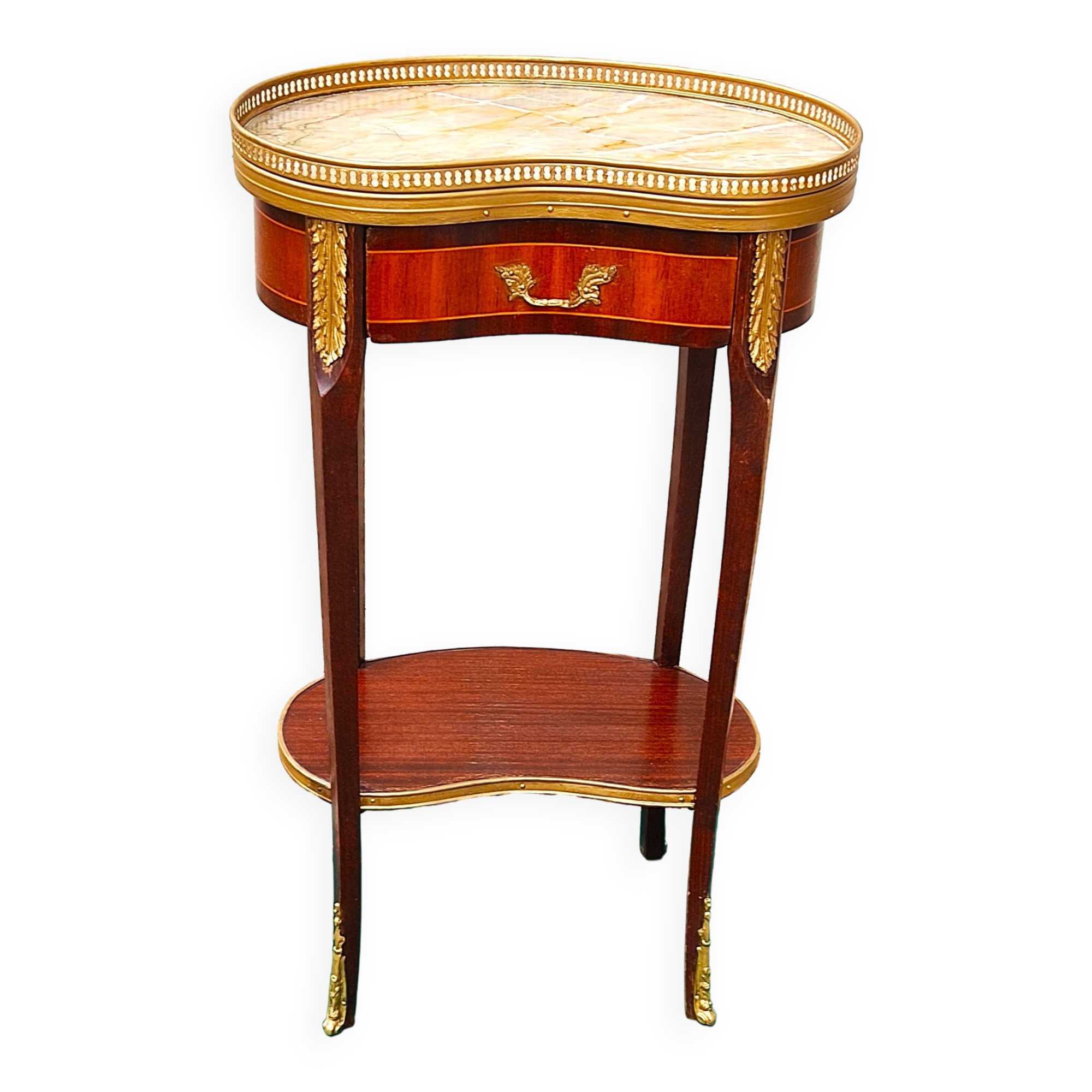 Louis XVI period pedestal table, in solid mahogany and veneer, and in gilded bronze.