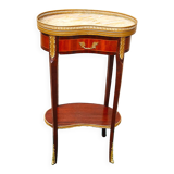 Louis XVI period pedestal table, in solid mahogany and veneer, and in gilded bronze.